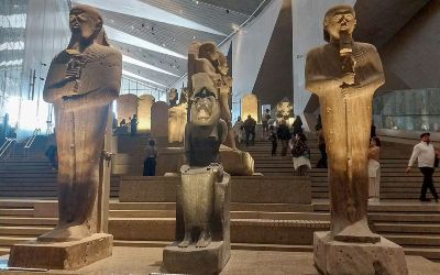 Monumental statues on the Grand Staircase inside the Grand Egyptian Museum