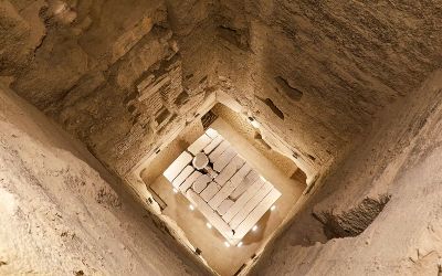 Underground burial chamber with massive granite sarcophagus in the Serapeum of Saqqara